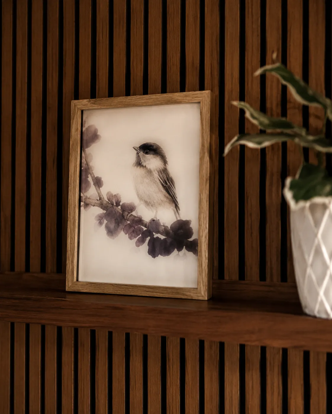 Framed bird print on a wooden shelf in the Clearwater Counseling office